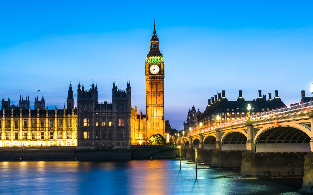 Westminster abbey and big ben in the London skyline at night, London, UK